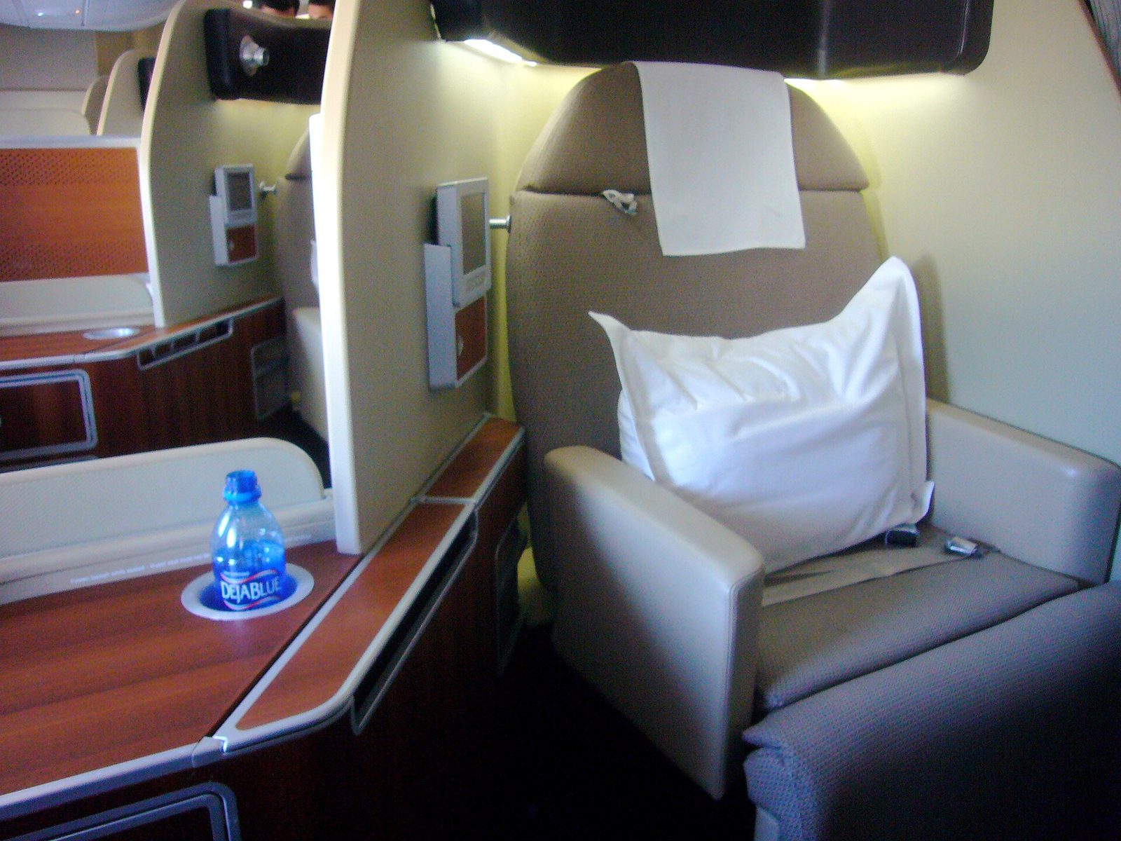 Private first class suite with armchair and side table